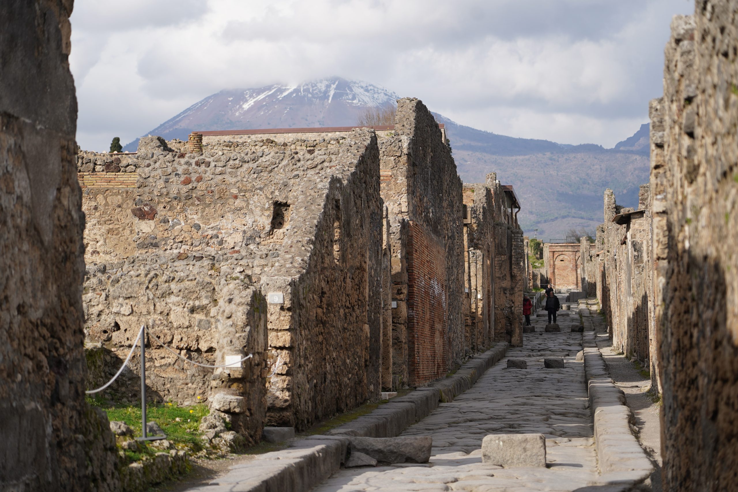 In AD 79, the city was destroyed and buried under several feet of volcanic ash and pumice when Mount Vesuvius erupted.