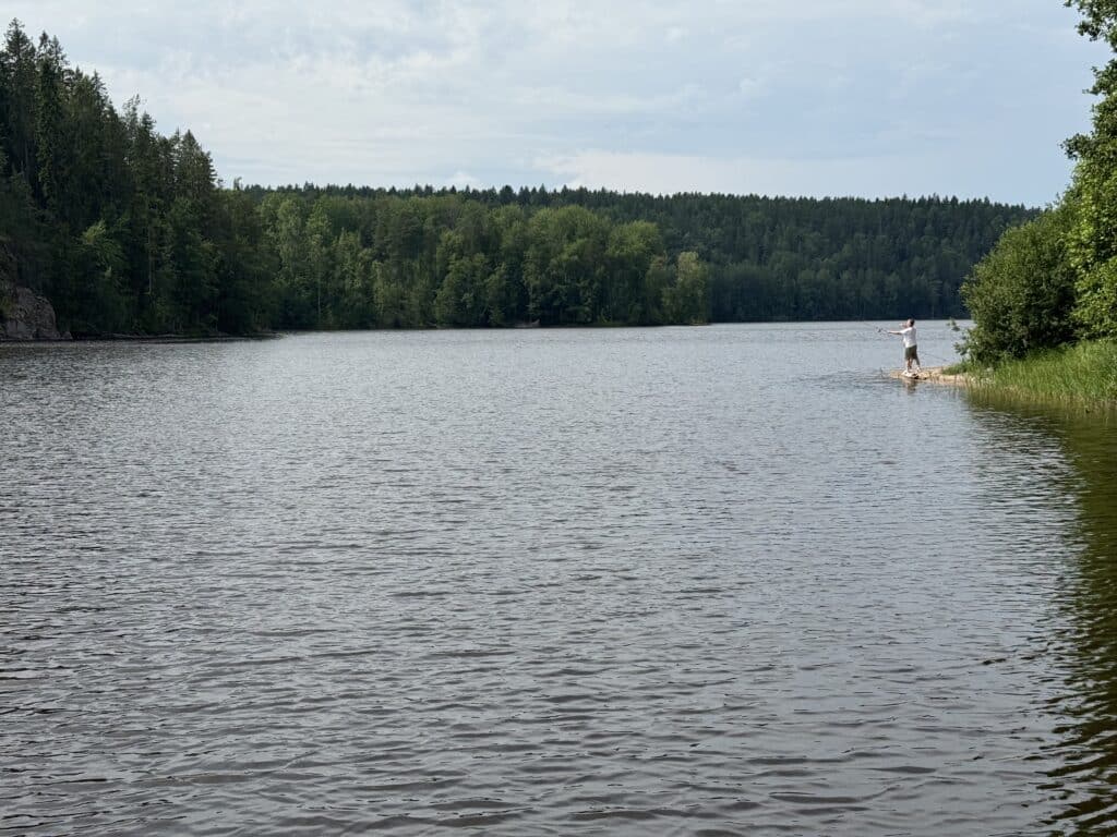 Finland angler casting on the lake
