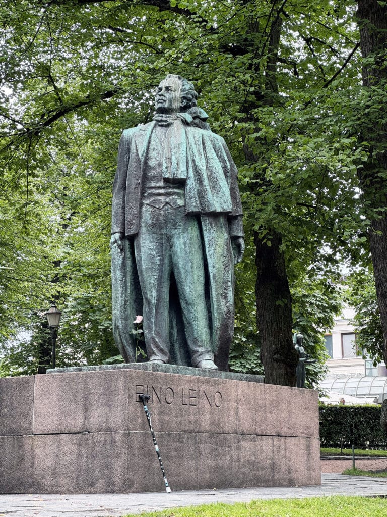 The Eino Leino statue with a rose left at its base