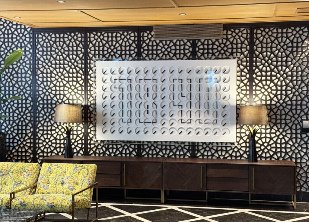 The kinetic puzzle-panel art piece in Hotel U14's lobby