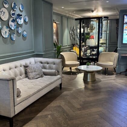 100 Queen's Gate Hotel Curio Collection London Kensington lobby lounge seating and curiosity cabinet